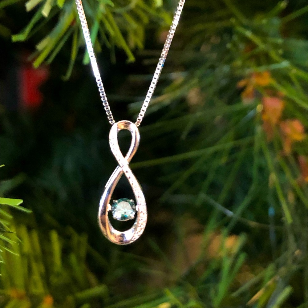 Blue, floating diamond pendant